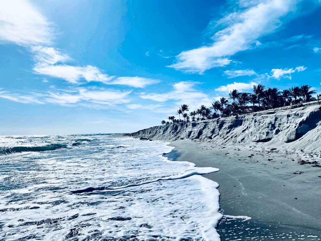 Bald Head Island Shoaling and Dredging: How Erosion and Navigation Changes Affect Waterfront Property Values — Carolina coast real estate